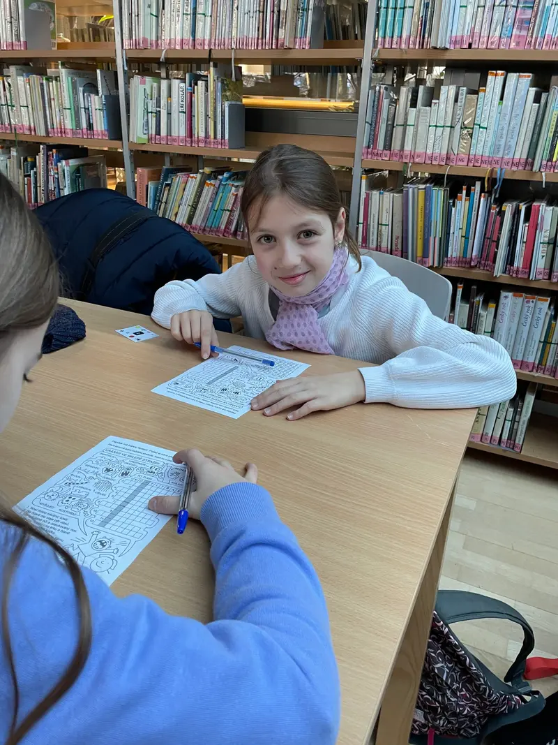 Třeťáci a čtvrťáci v knihovně