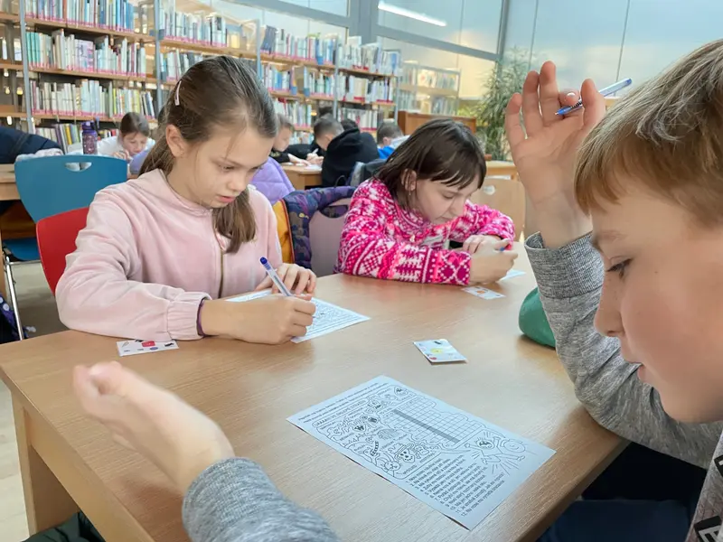 Třeťáci a čtvrťáci v knihovně