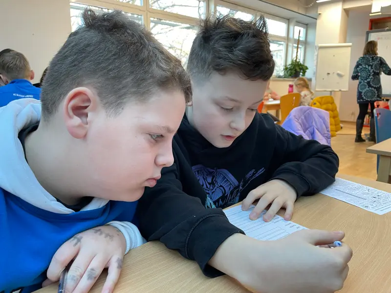 Třeťáci a čtvrťáci v knihovně